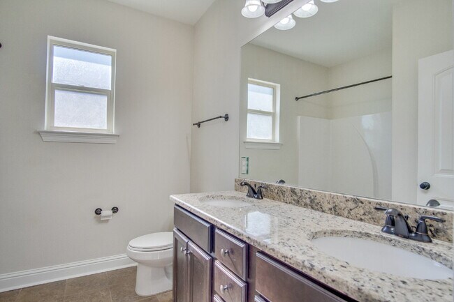 Building Photo - Stunning Move-In Ready 3-Bed, 2-Bath Energy-Efficient Brick Home in Pace with Brand-New Flooring,...