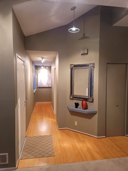 Entry area solid wood flooring hallwat towards the Bathroom and bedrooms - 7909 Caminito Dia