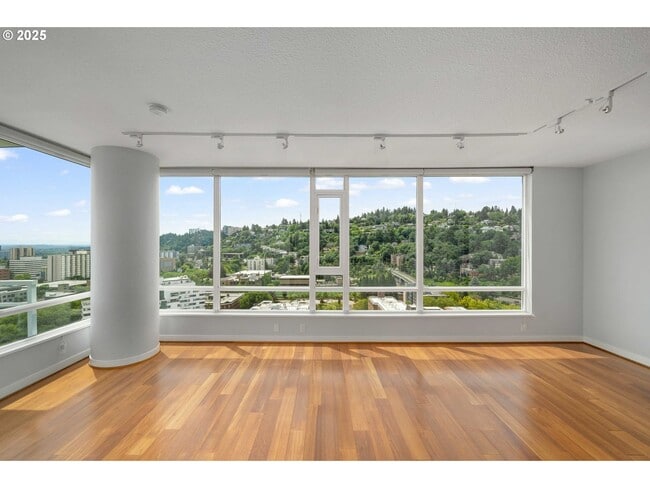 Building Photo - Modern 2-Bed/2-Bath Condo with Balcony & Prime Downtown Location