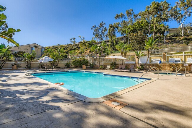 Building Photo - Renovated 3-Bed Condo with In-Unit Laundry, Garage & Pool