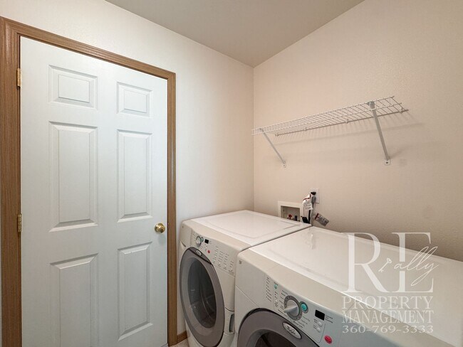 Building Photo - Dual Primary Suites, Huge Backyard Deck & Sun-Filled Living Spaces Near Everyday Conveniences