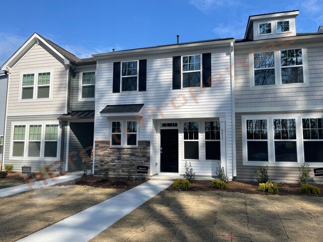 Building Photo - Modern Comfort Meets Peaceful Living—Stunning 3 Bedroom Townhome Near Downtown Raleigh Available ...