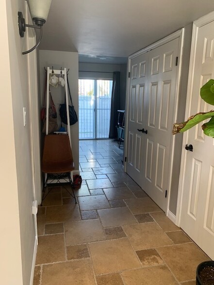 hallway, washer and dryer located behind double doors. - 2600 Brookside Dr