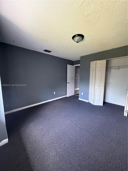 Building Photo - 18602 NW 46th Ave