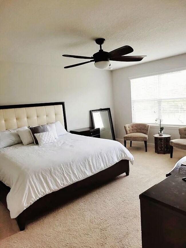 Building Photo - Spacious 4-Bedroom Home in Amelia Walk wit...