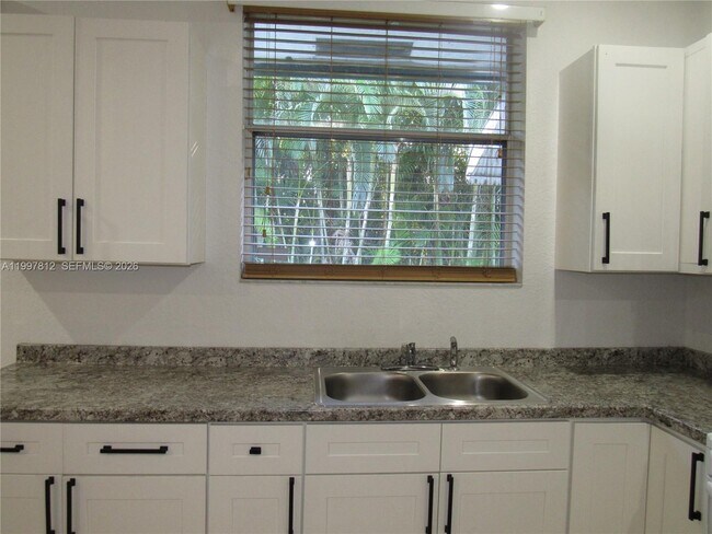 Building Photo - 15900 SW 54th Pl