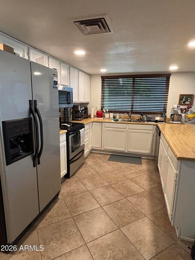 Building Photo - 11322 N 69th Dr