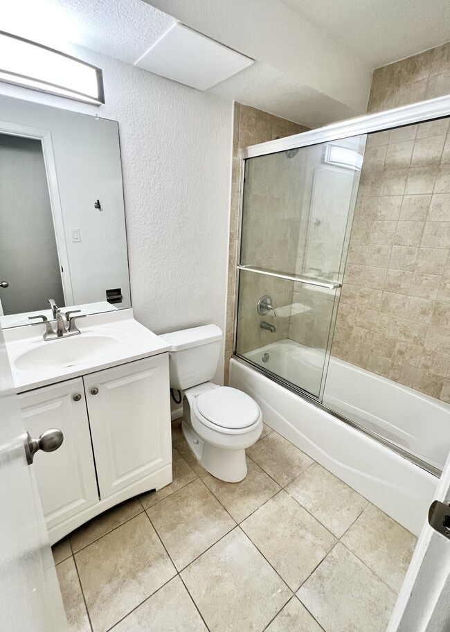Experience luxury in this elegantly designed modern bathroom. - 591 West Prentice Avenue