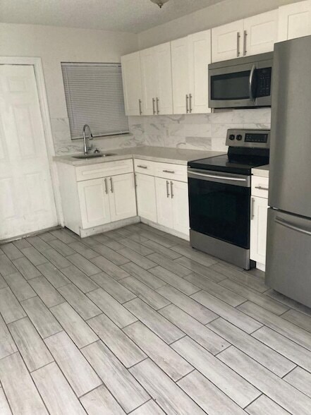 Building Photo - 1565 W 36th St