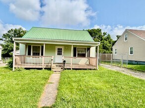 Building Photo - The "More Room to Roam" House: 4 Beds, 2 B...