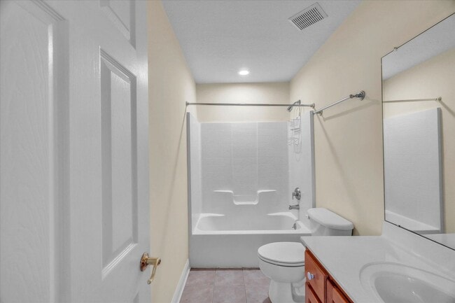 Building Photo - Stunning all-brick home on a large wooded lot