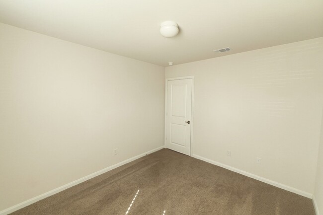 Building Photo - 612 Stampede Ln