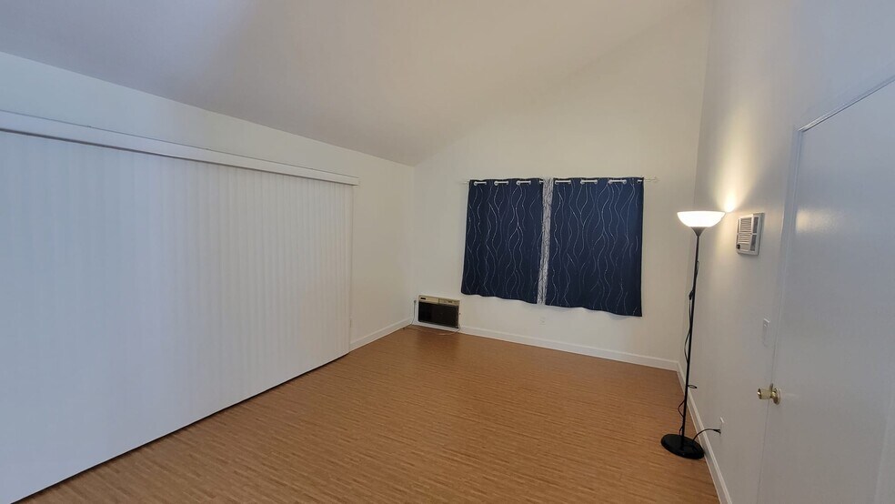 Master Bedroom has a 10ft wide sliding door with brand new vertical blinds - 9505 Easter Way