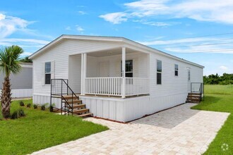 Building Photo - 6681 Hidden Oaks Dr