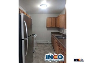 Building Photo - Comfortable 2 bed 1 bath Condo Near Sloans...