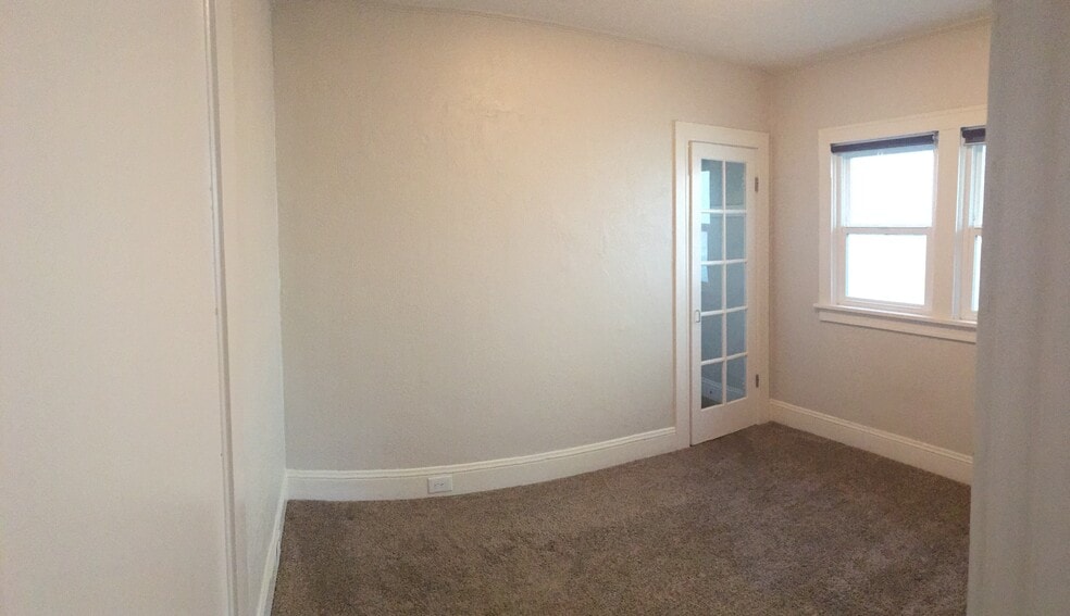 Bedroom with walk-in closet. - 5726 North Montana Avenue