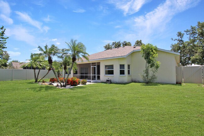Building Photo - Annual rental: Spacious 3BR/2BA Creekwood Home with Office, Screened Lanai, EV Charger & Resort-S...