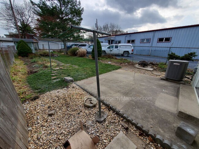 Building Photo - Pet Friendly 3 beds, 1.5 bath, central A/C, off-street parking, basement with included laundry, a...