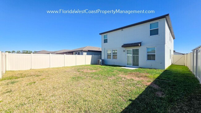Building Photo - BRILLIANT and SPACIOUS! 4 BEDROOM/2.5 BATH PLUS LARGE BONUS-FLEX SPACE and FENCED YARD!