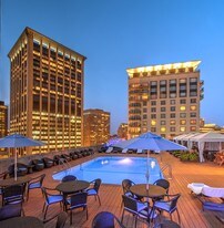 Eat, drink & be merry poolside - The Colonnade Residences