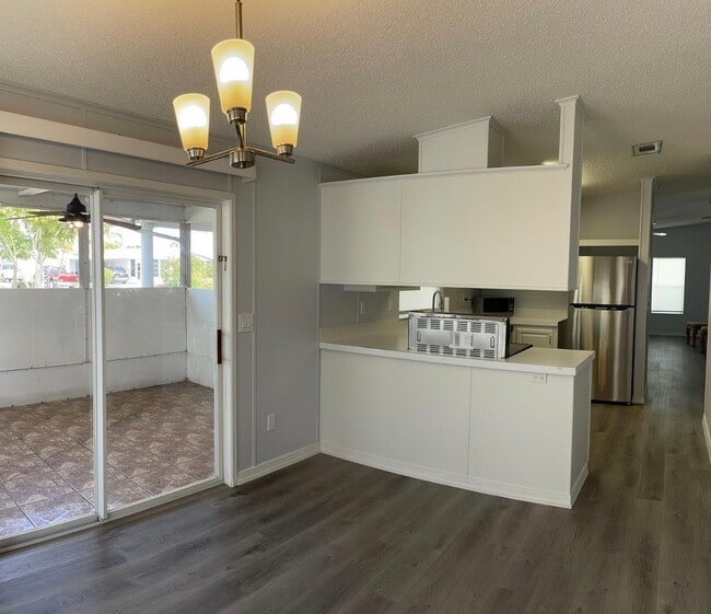 Building Photo - 8179 Sandwedge Terrace