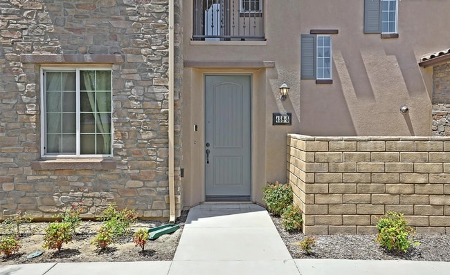 Building Photo - This gorgeous 3-bedroom, 3.5 bath townhome...