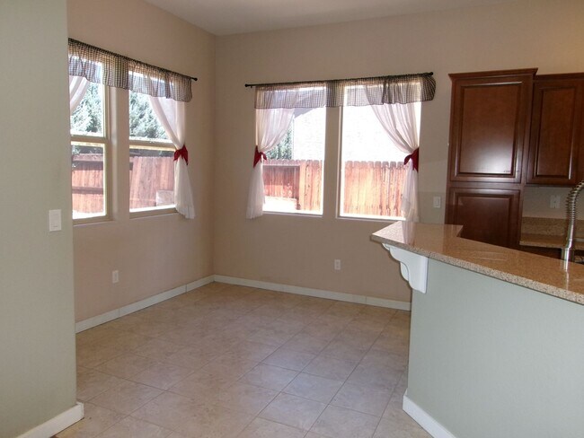 Building Photo - Spacious home located in gated community.