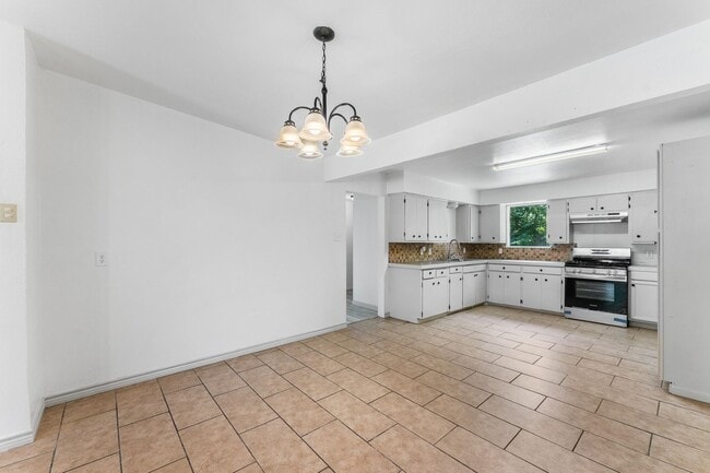 Building Photo - CENTRAL CITY FOUR BEDROOM TWO BATH HOUSE!