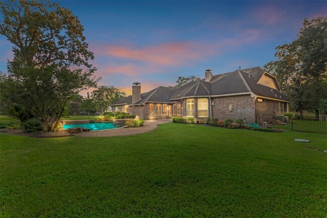 Building Photo - 19309 Whispering Grove E