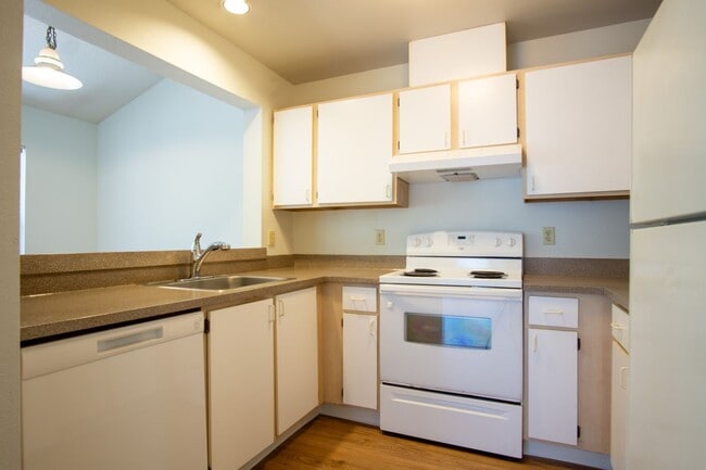 Building Photo - Major Updates: Vaulted Ceiling Spacious 2-Bed 2-Bath w DW, WD, Balcony!