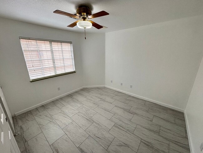 Building Photo - This inviting single-story home boasts a s...
