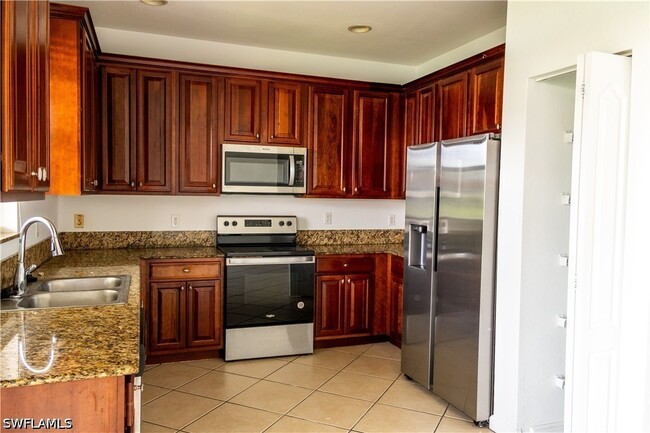 Building Photo - 7029 Ambrosia Ln