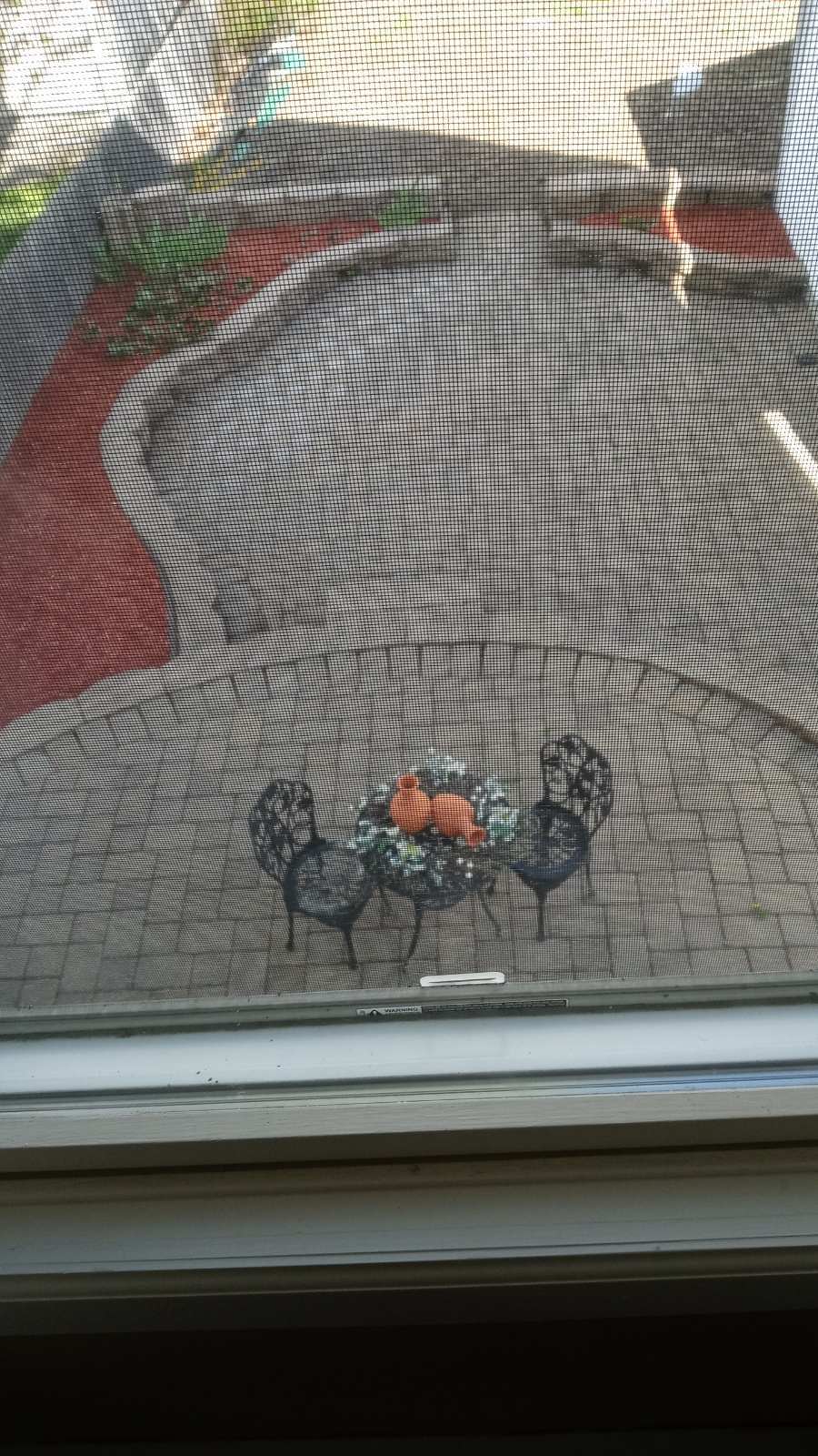 Walk out to a beautiful private patio. - 680 Belmont Ave