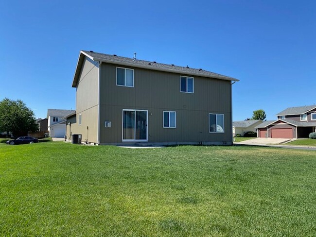 Building Photo - Large Corner Lot 4BR, 2.5BA Cheney Home In...