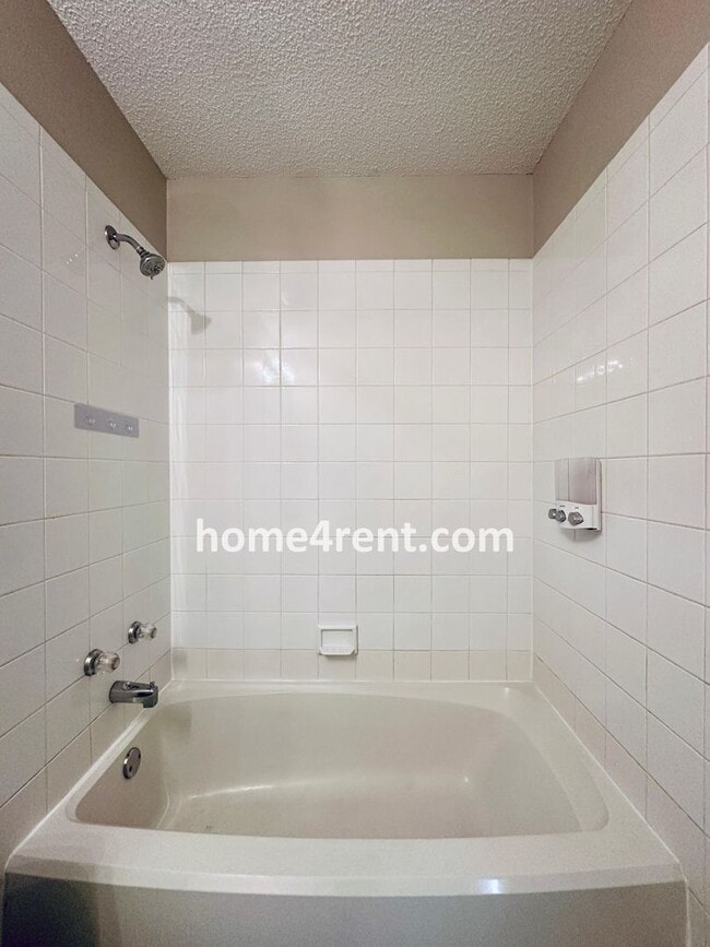 Building Photo - Brand New Paint, Wood Floors, Walkout Fini...