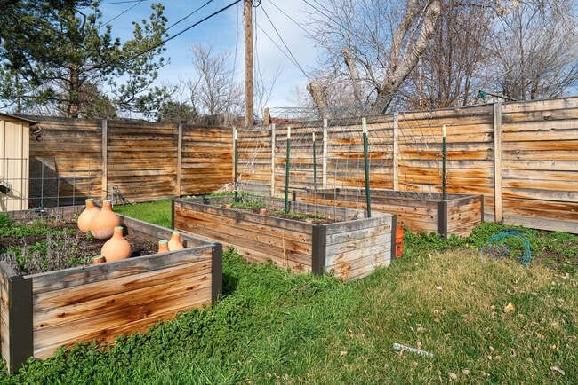 Building Photo - Beautiful Brick Home with Garden, Finished Basement & Detached Garage Office