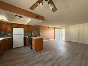Building Photo - New Flooring, no carpet. 2bed 2bath Gated Community with a Swimming Pool