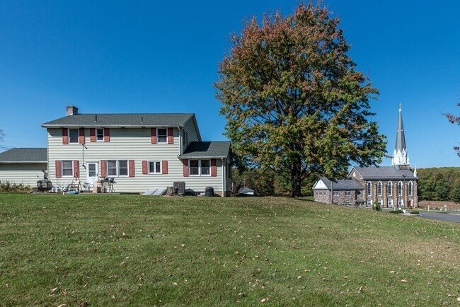 Building Photo - **Charming Colonial in Picturesque Lower Milford Township**