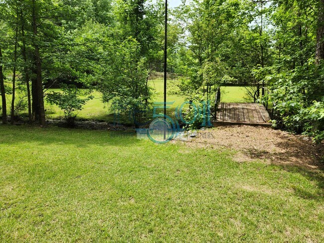 Building Photo - RARE exquisite home on acreage in the heart of West Little Rock!