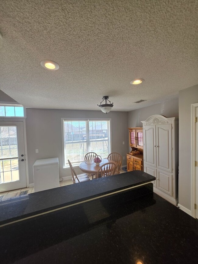 Building Photo - Available May! Non-Furnished Unit!