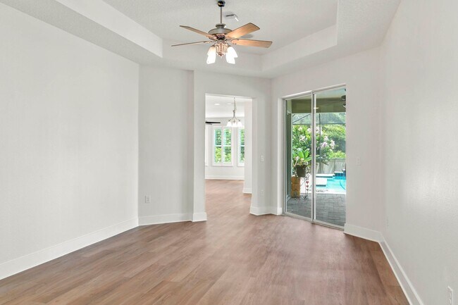 Building Photo - Expansive 4 bedroom, 3 bath remodeled home in gated community