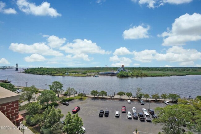 Building Photo - Welcome to your dream condo in the heart o...