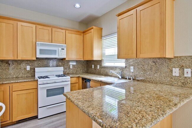 Building Photo - Awesome Home Located in a Quiet Tree Line Neighborhood