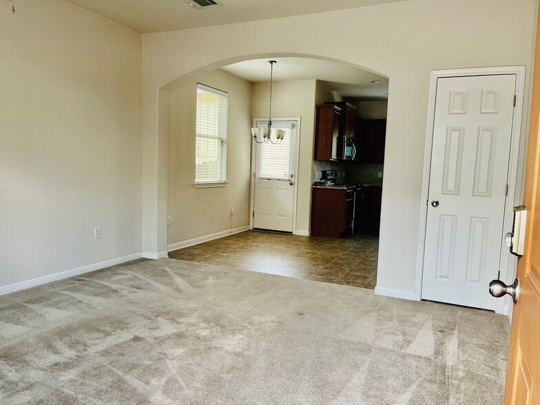 Living room, dining room, kitchen - 5424 Falling Leaf Ln