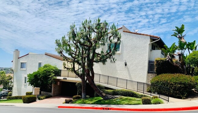 Building Photo - Unbeatable Location! Ocean View two bedrooms and two bathrooms two story condo with gated undergr...