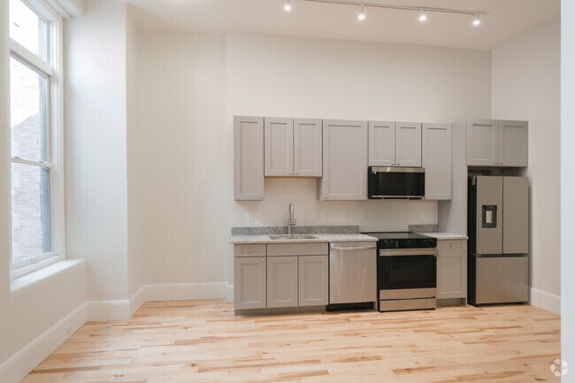 1BR, 1BA - 575SF - Kitchen and Living Area - 130 Pearl St