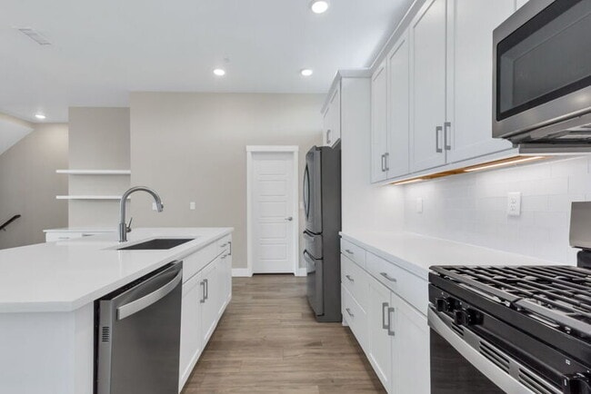 Building Photo - 1555 W 67th Ave