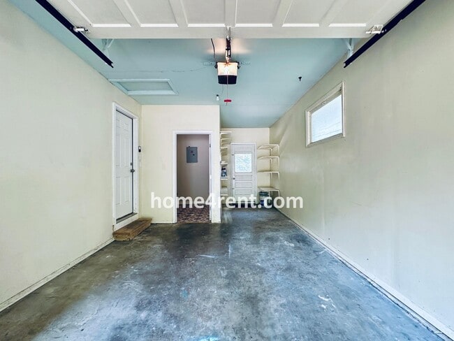 Building Photo - Attractive Prairie Village Ranch w/ FRESH PAINT, Wood Floors, Granite Counters and a Fenced Yard!