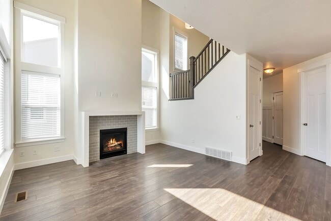 Building Photo - Modern Row End Townhome w 2 car attached g...