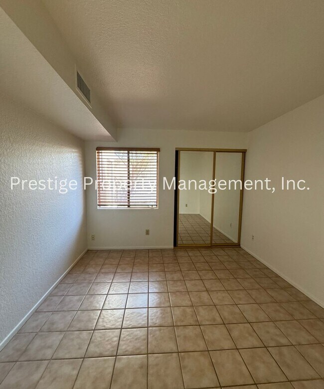 Building Photo - Totaling 3/3 With The Guest House; This Lovely Central Townhome is Everything You Need!